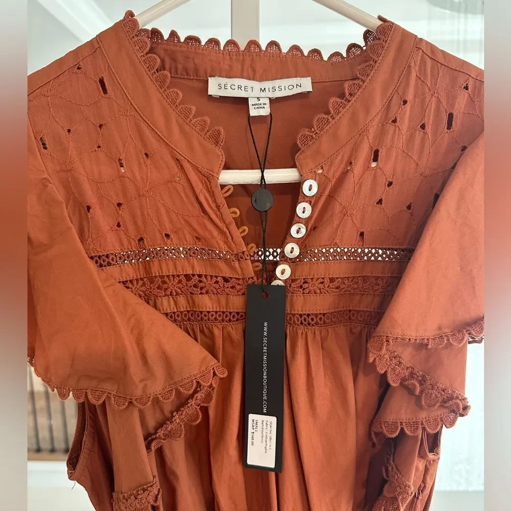 Secret mission bartolina dusty orange dress